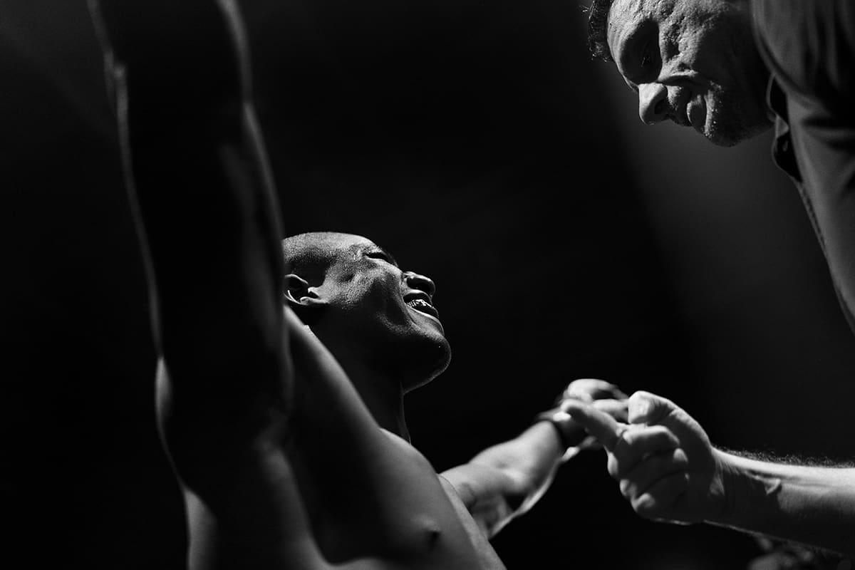 Pedro Magalhaes celebrates his TKO victory over Jesus Basco inside the WOW FC cage during an MMA event in Bilbao.