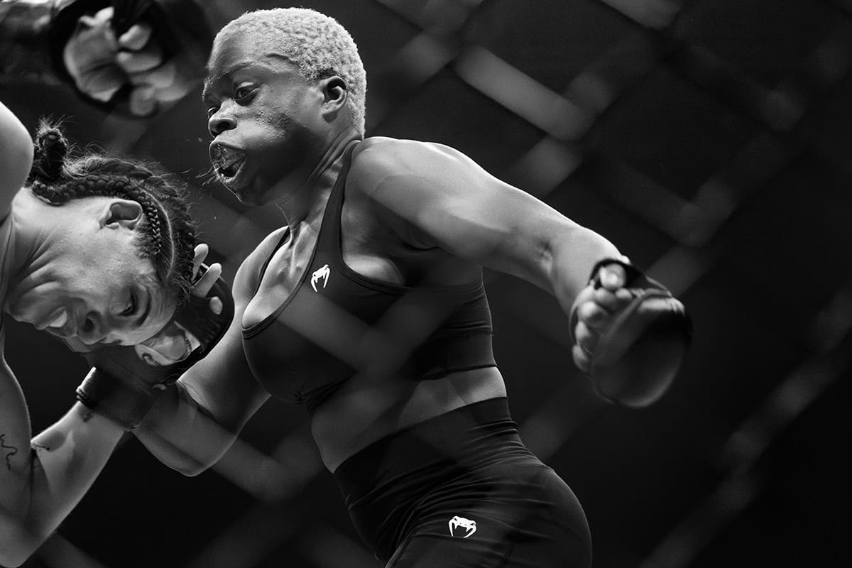 Leonor Osifo exchanges strikes with Mar Montorio during an amateur featherweight MMA fight at WOW 26 in Bilbao, Spain.