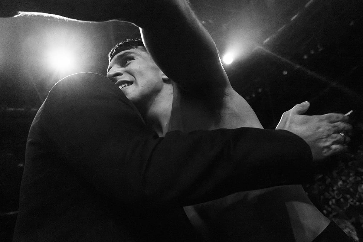 Diego Esteche celebrates his submission victory in an amateur bantamweight MMA bout at the Madrid Arena.