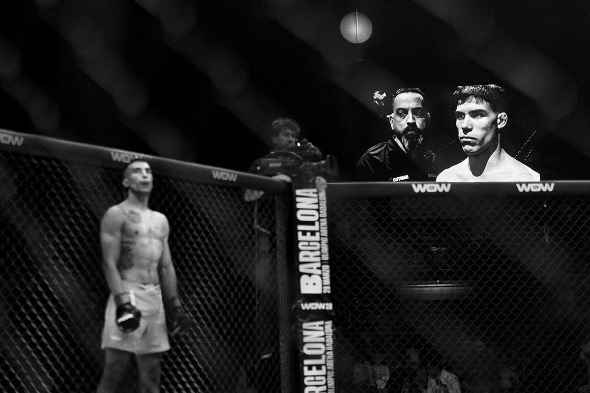 Fighter Iker Davila focuses before entering the cage for a mixed martial arts match in Bilbao.