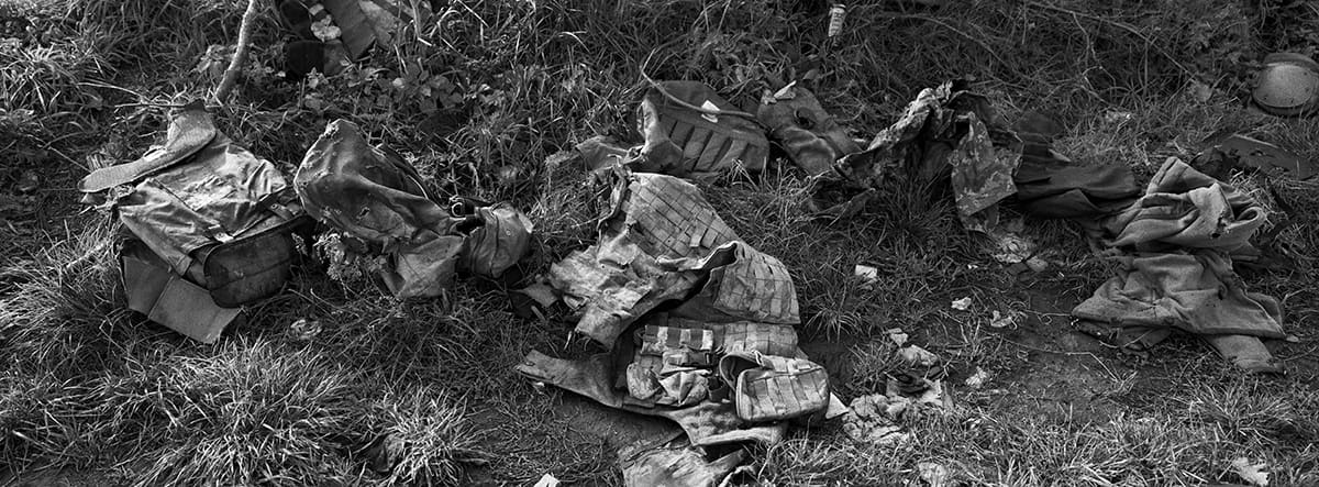 Remains of Russian uniforms belonging to combat casualties in the village of Dementiivka.