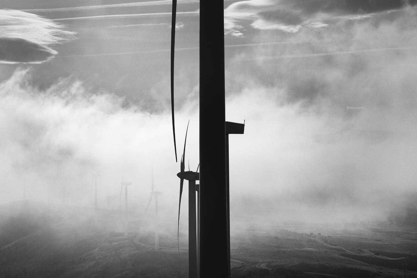 Wind turbines of the Aldeavieja wind farm over the Sierra de Ojos de Albos, Ávila, Spain, 2025