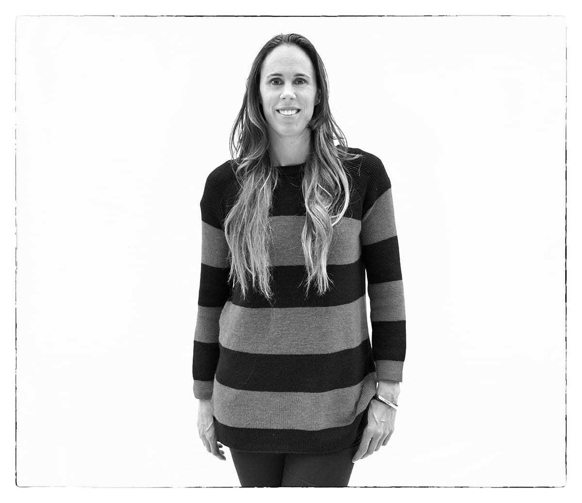 Black and white studio portrait of Amaya Valdemoro, basketball player, from the series Ñ by Álvaro Ybarra Zavala.