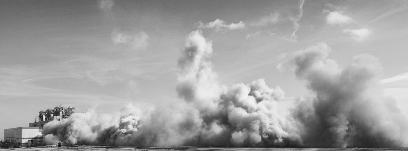 Collapse of the Andorra power plant chimney seen from the plain, Teruel, Spain, February 2023