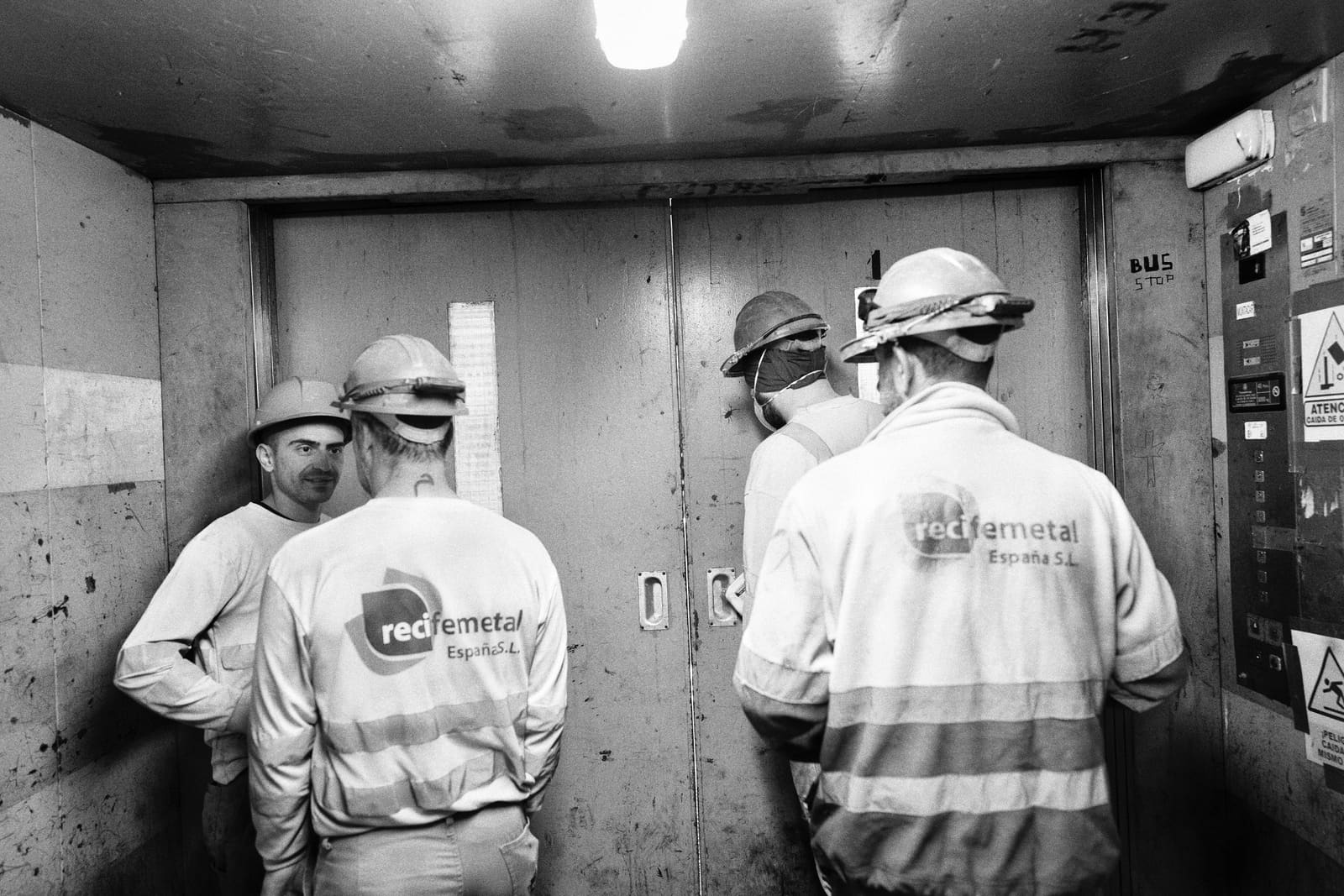 Workers sorting demolition debris for recycling at the As Pontes power plant, Galicia, Spain, 2025