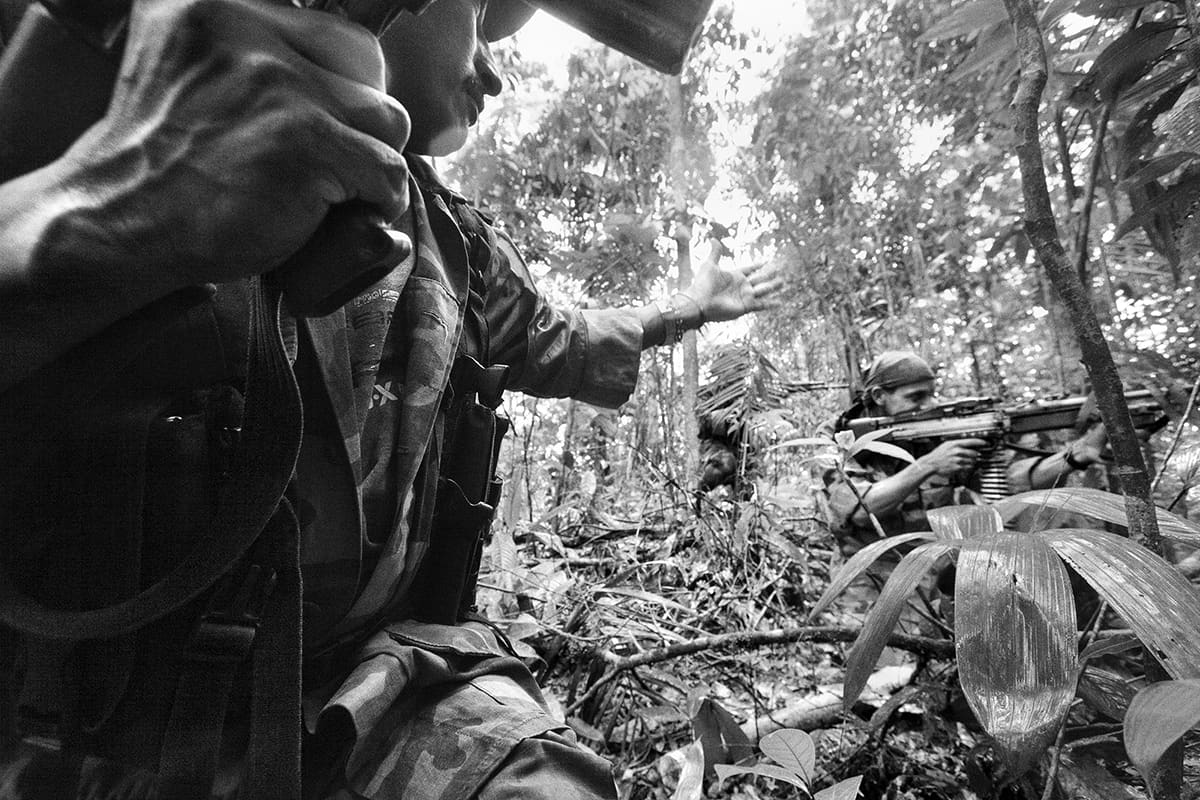 Bloque Móvil Arturo Ruiz FARC unit on patrol through remote southern Colombian jungle, 2007