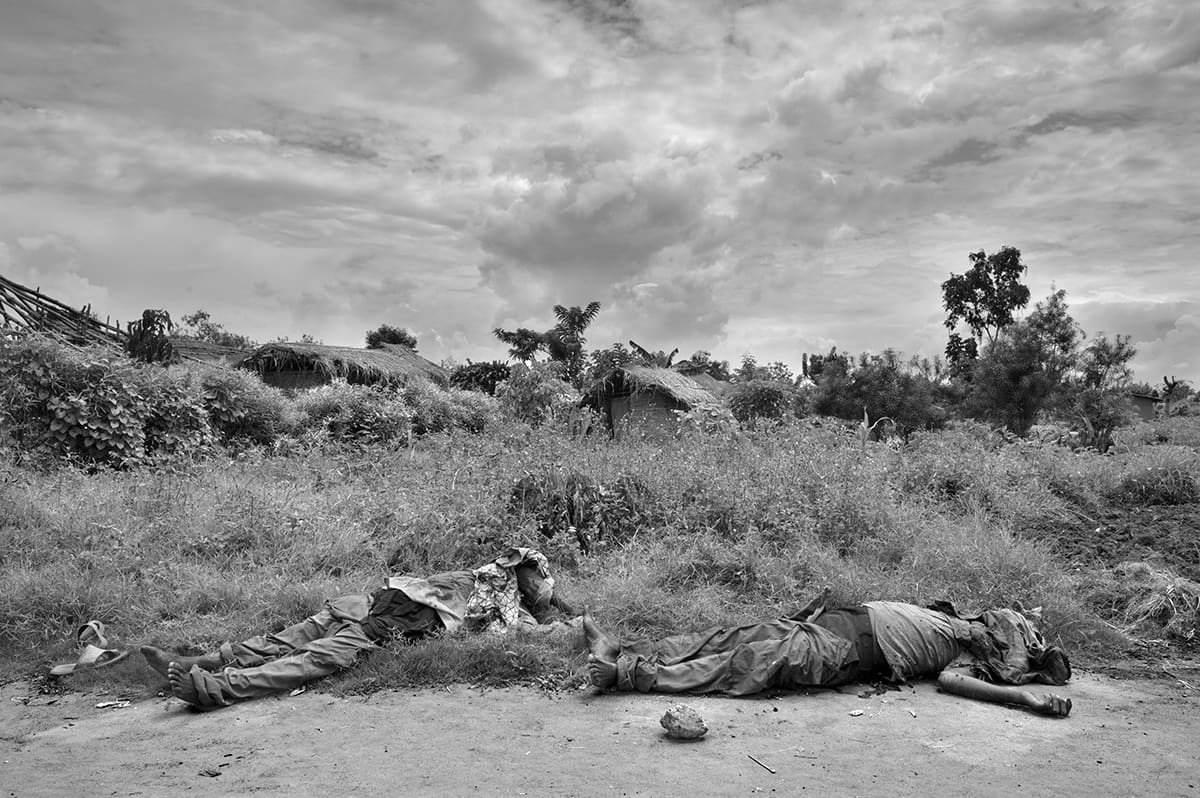 The bodies of executed civilians lying on the ground after the Kiwanja massacre in North Kivu.