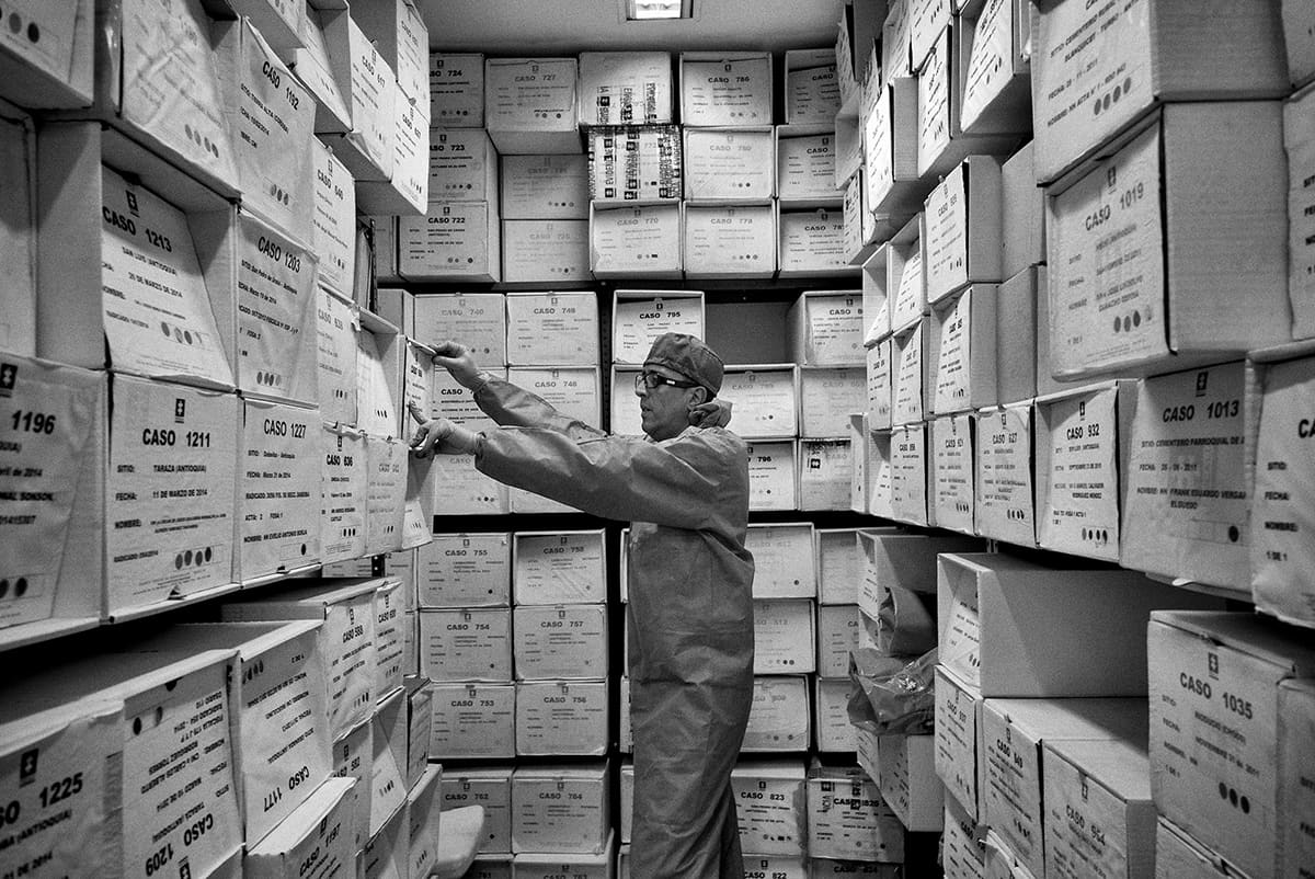 Cardboard boxes of unidentified human remains stored in a Medicina Legal laboratory in Medellín, 2015