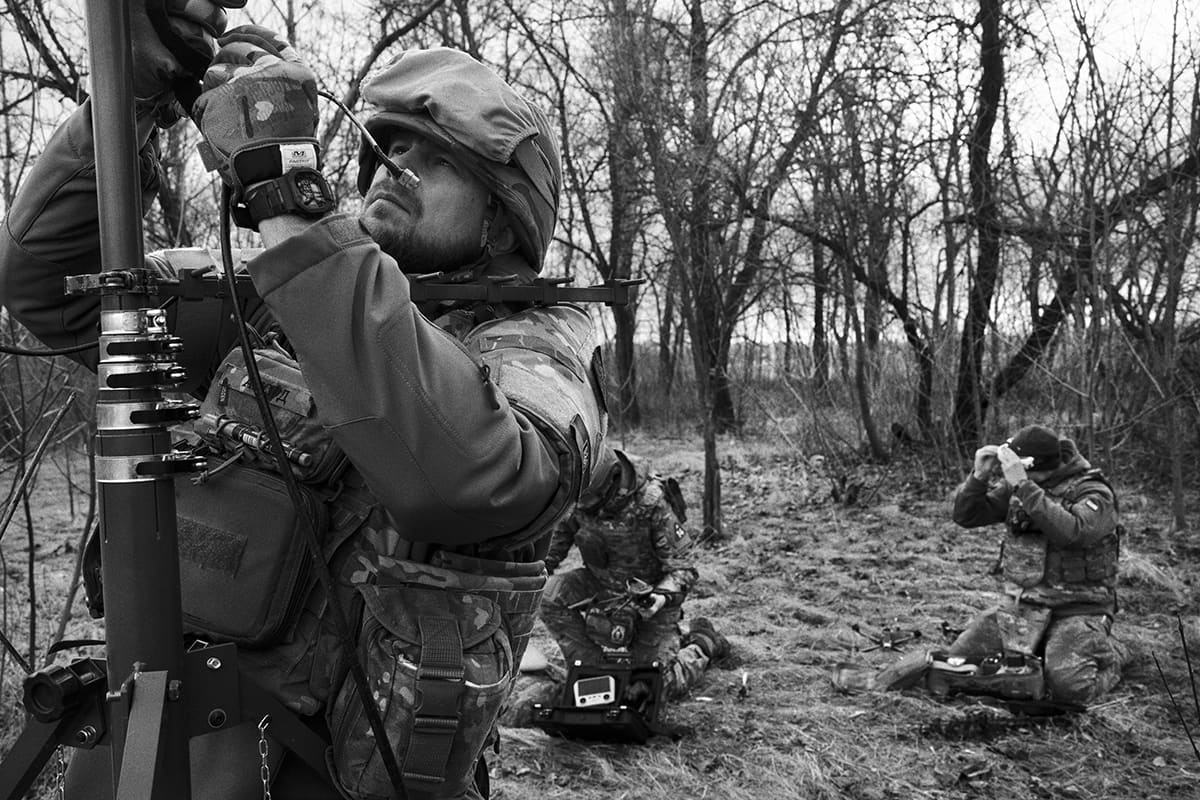 An elite Ukrainian army unit preparing a kamikaze drone during an operation in Pokrovsk.