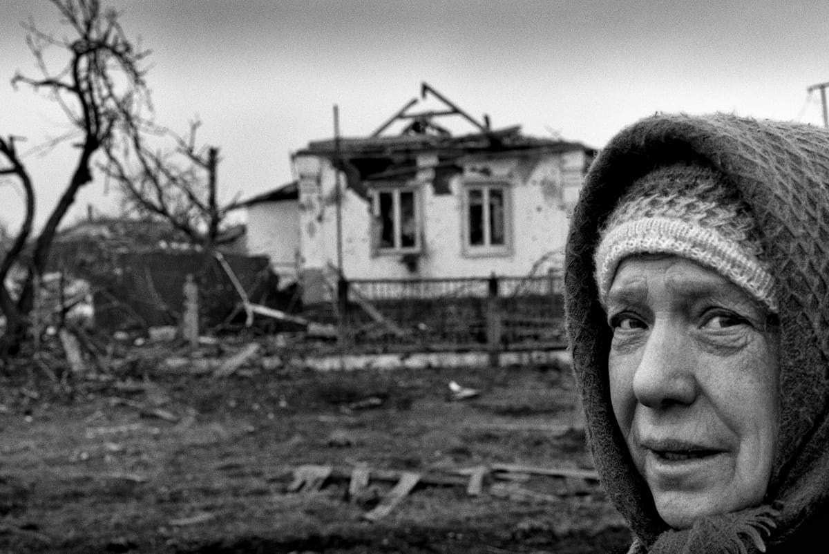 One of the few civilians who stayed in Nikishyne during the fighting, inside her underground refuge.