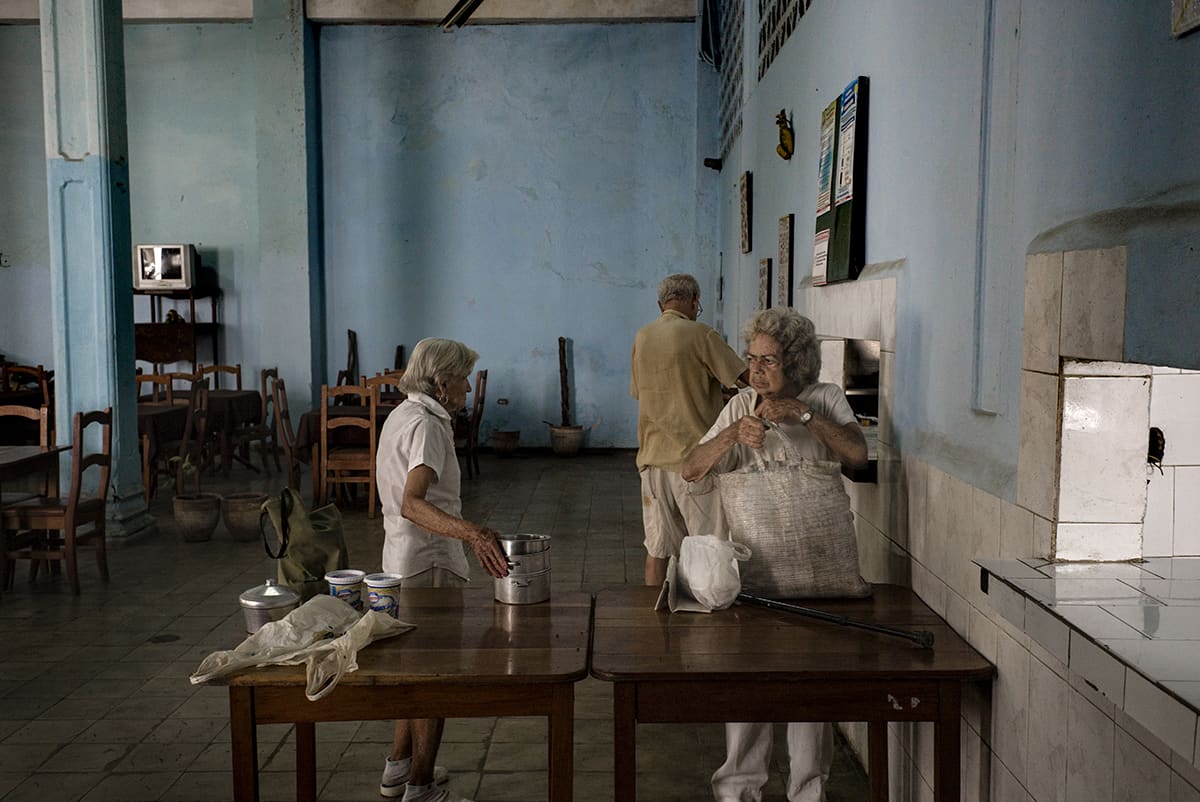 Distribution of food in a social kitchen in Old Havana, Cuba.