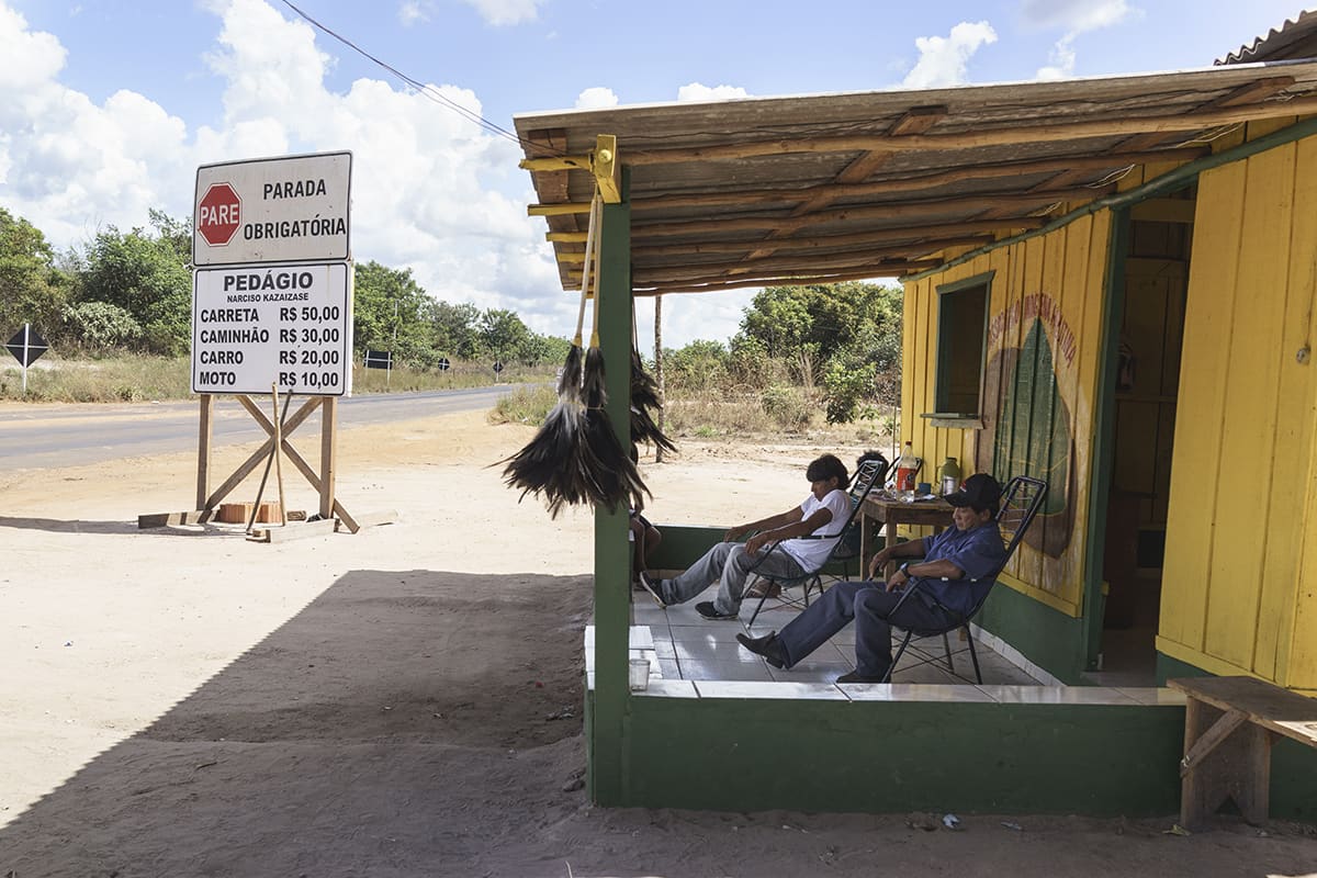 Indigenous toll station on a road crossing a reservation