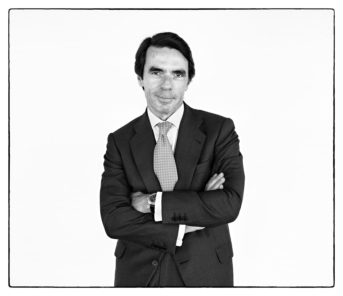 Black and white studio portrait of José María Aznar, politician, from the series Ñ by Álvaro Ybarra Zavala.