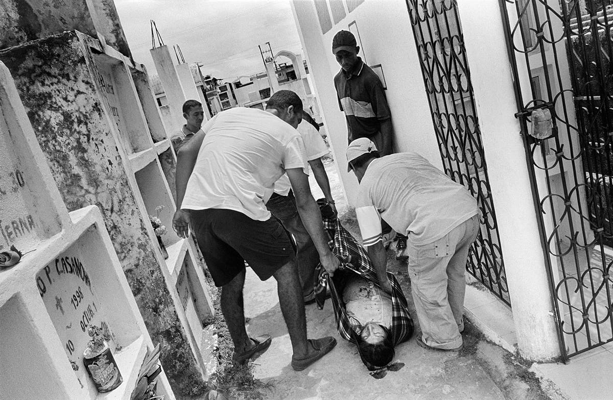 Body of María Pascual, killed while pregnant, lies in the cemetery of La Guayacana, Tumaco, on the Pacific coast, 2009