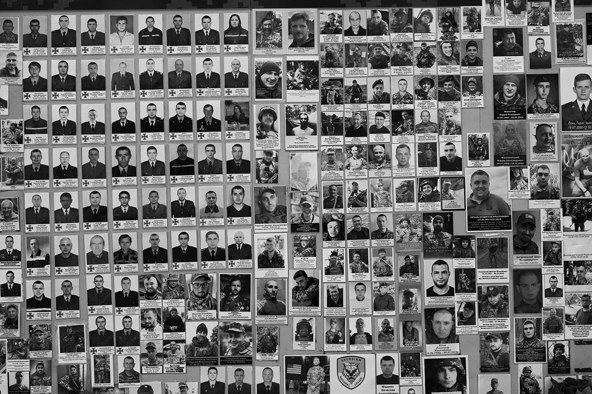 A memorial in central Kyiv with the faces of soldiers killed defending Ukraine.