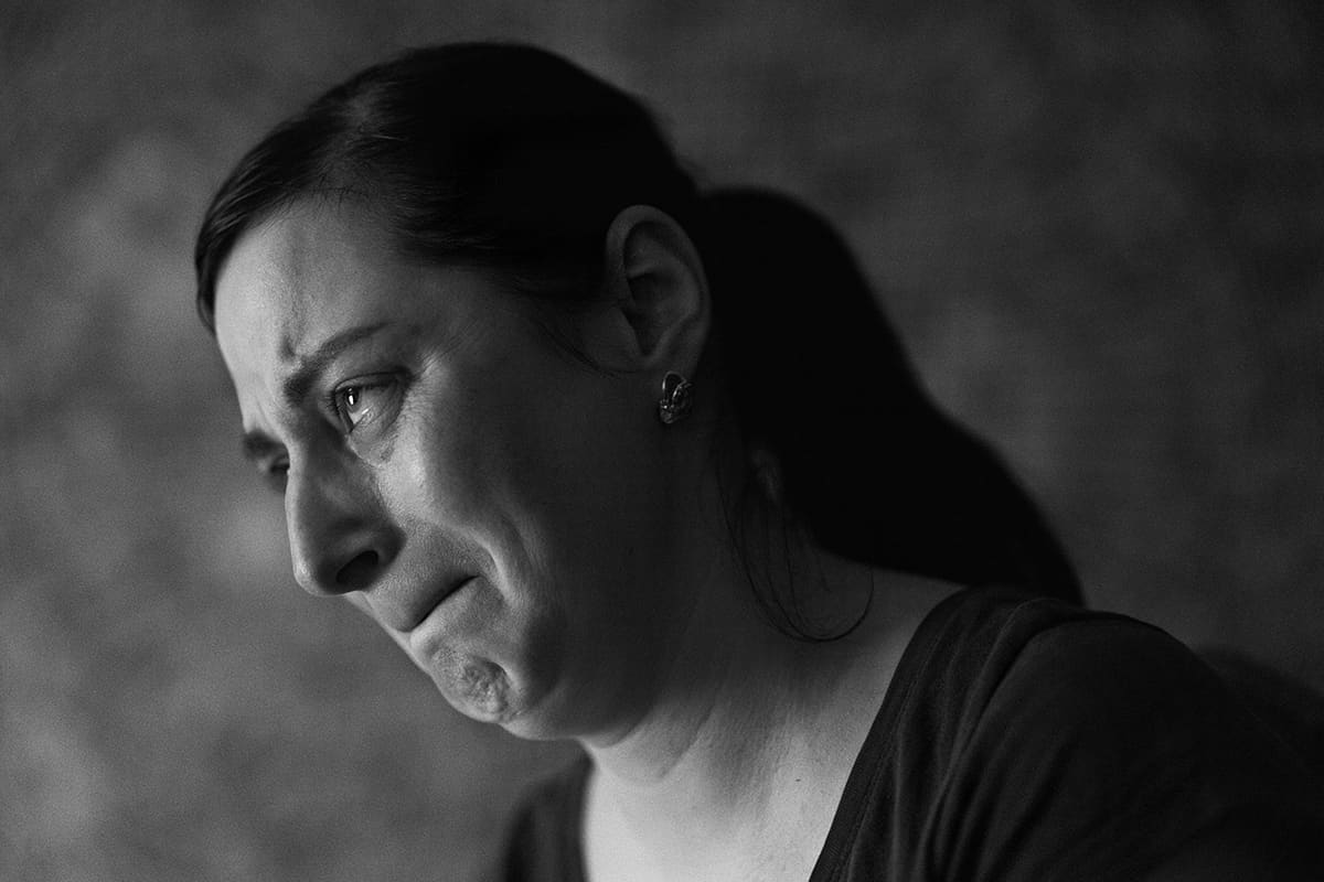 Iryna, a survivor of the Bucha massacre, in the apartment where she took refuge with her son.