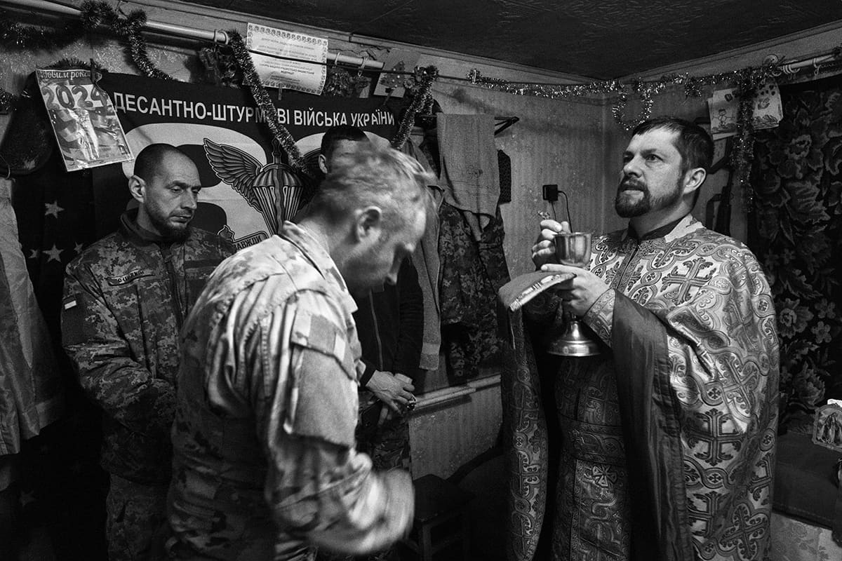 Father Ivan celebrates Mass inside the base of an 80th Brigade unit on the Bakhmut front.