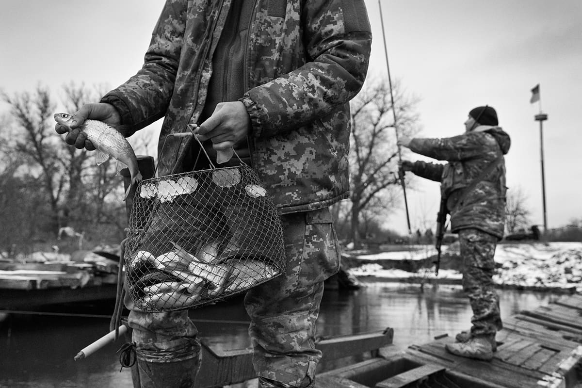 Ukrainian soldiers fishing near Siversk to add something to their rations.