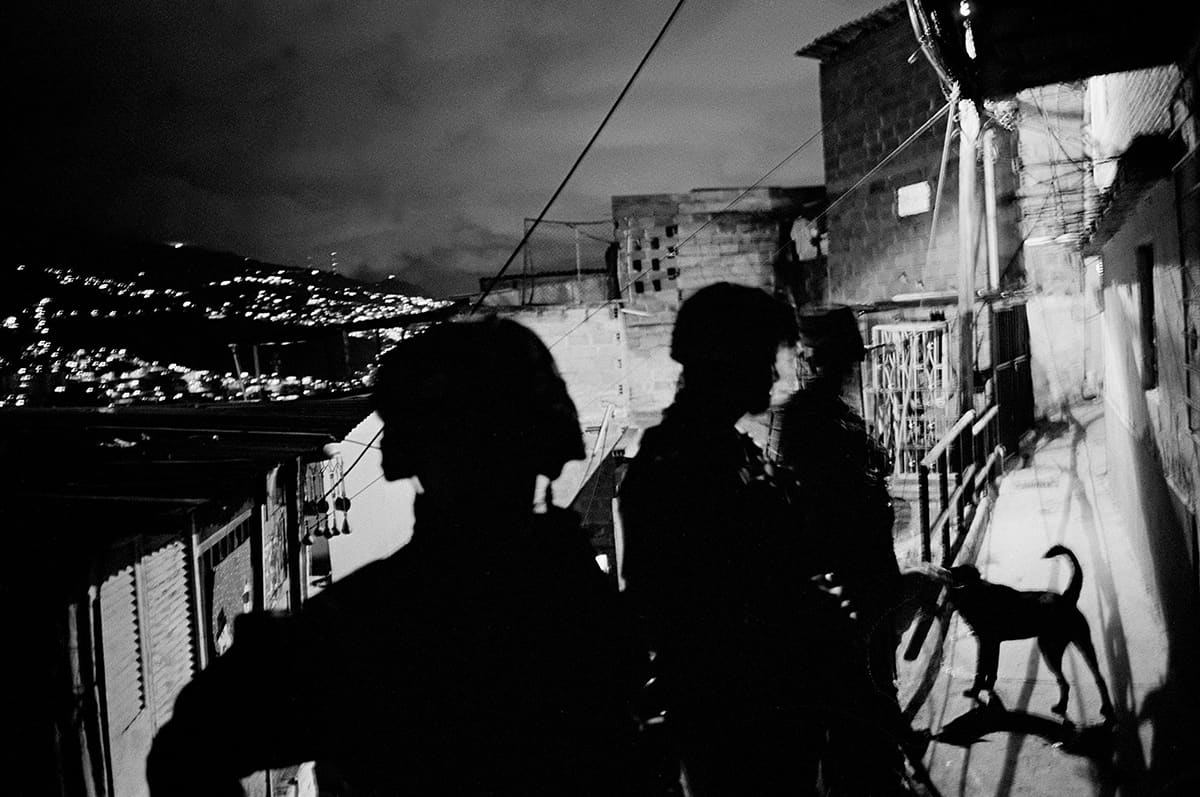 Soldiers patrol Comuna 13 of Medellín, scene of the 2002 Operación Orión, 2011