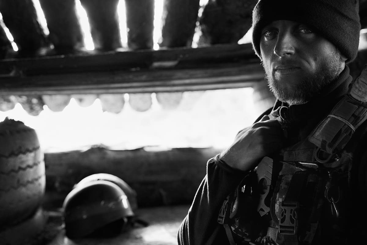 A Ukrainian soldier inside a front-line position on the Kherson front.