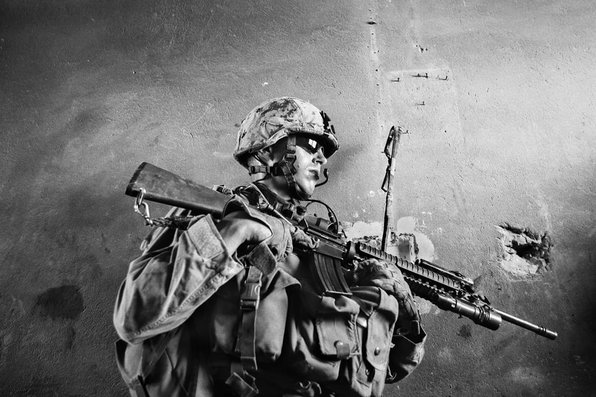US Marine Sergeant Joseph Benners during a house search in Fallujah during the Iraq War 2003